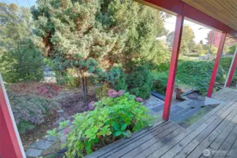 Hidden from the street with mature plantings.