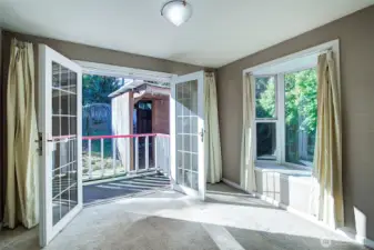 Dining room with south facing French doors opens to large rear yard.
