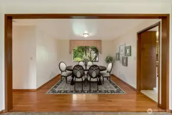 Enjoy memorable meals in the elegant formal dining room, ideal for holiday dinners, family gatherings, or intimate dinners with friends.  [This photo is virtually staged.]