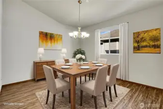 The dining room is spacious enough to hold large gatherings! Virtually staged.