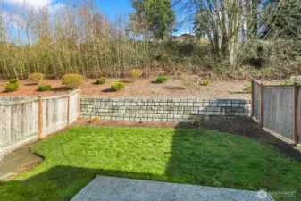 Private partially-fenced backyard and patio, perfect for outdoor entertaining!