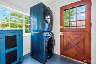 Washer/dryer on main floor off kitchen.