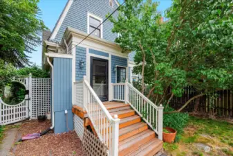 Fenced back yard with basement access