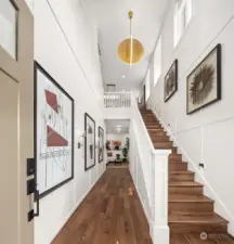 Dramatic two-story foyer. Photo of the Alabaster model home, includes upgrades & is not of actual home listed for sale.