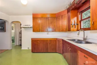 View of the kitchen from the downstairs bedroom.