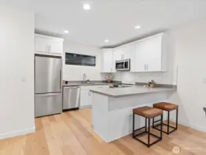 Engineered hardwoods on the main floor.