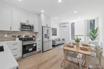 Open concept with high ceilings. Model unit, finishes may vary.