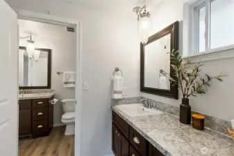 vanity and sink can be closed off from the other side of the bathroom for extra privacy.
