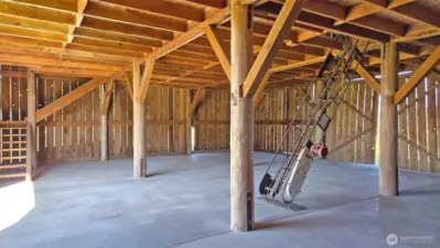 Lower level of Barn with hay conveyor