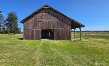 Barn with pasture behind