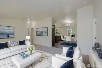 Living room looking into Kitchen (Virtual Staged)