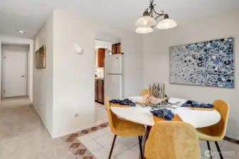 Previously staged dining are. Condo is now vacant.