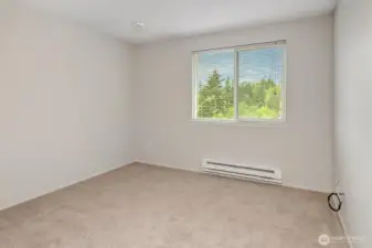 Second bedroom with brand new carpet.
