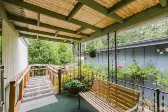 At the end of the ramp, the welcoming covered entry deck awaits.