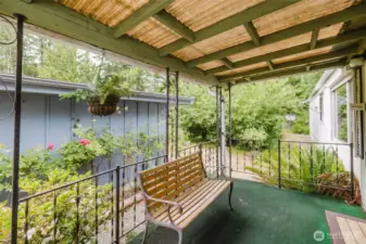 The view of the garden from the entry deck.  Roses, six apple trees, and berries provide nourishment for body and soul.