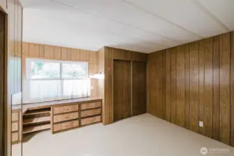 Another view of the Primary, showing the built-in dresser and the second double closet.