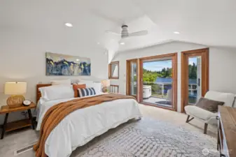 Elegant primary suite opens to balcony and lake! Beautiful bath & walk-in closet!  Hot tub!