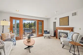 Gorgeous bonus studio ensuite! Huge room that opens to balcony & lake! Cozy wood burning fireplace. Cozy sleeping nook or workout space or even den! Stunning bath with marble!