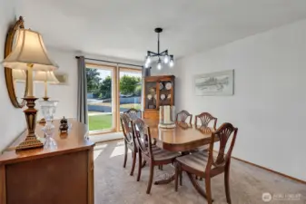Floor to Ceiling Windows in the Living & Dining rooms Bringe an abundance of Natural light into this home!