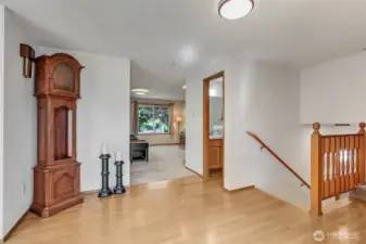 Entry shows easy 5 stairs access to the Bonus recroom in the lower level and the 5 stairs access to the bedrooms on the second level is the best alternative for easy living.