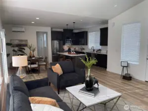 Great room concept with open area with lots of light.