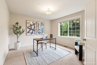 The office is ideally located just off the foyer. There is beautiful natural light in this room.