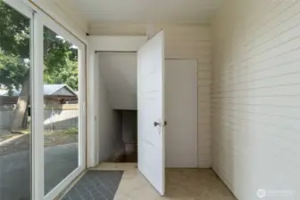 mud room off of kitchen  access to rear yard and basement - laundry