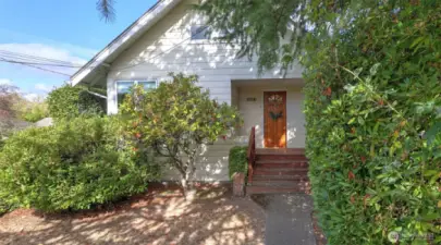Discover the charm of Seward Park and Columbia City living in this spacious, light-filled home with flexible spaces and strong investment potential. The main home offers two bedrooms with a shared Jack & Jill bath, a bonus den/office, and a basement. The ADU adds a private 1-bed, 1-bath retreat—perfect for guests, rental income, or multi-generational living. Enjoy well-maintained hardwood floors in the living and dining room and new vinyl plank flooring in the bedrooms! You will love the large detached garage and partially fenced yard with ample space to run and play while the covered front porch provides year-round enjoyment. Minutes to Lake Washington, Seward Park trails, and easy I-5/I-90 access.