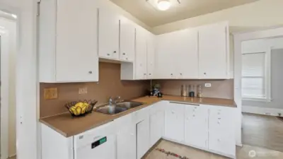 Stay organized with abundant cabinetry and countertop space.