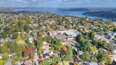 Bird’s-eye perspective highlighting proximity to schools, parks, and the lake, with the city skyline just minutes away.