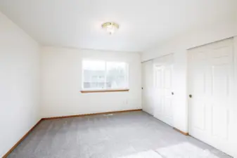 Primary bedroom with double closets