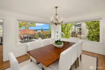 Dinng room overlooks deck.