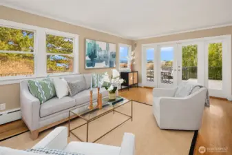 Family offers French doors that lead to deck.