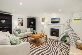 Lower level family room with cozy gas fireplace.  3/4 bath adjacent(not shown)