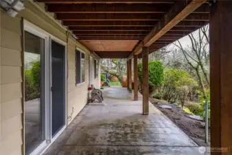 The downstairs patio runs the length of the house and provides even more space for entertaining or just enjoying the backyard.
