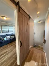 extra special touches including this barn door for space saving