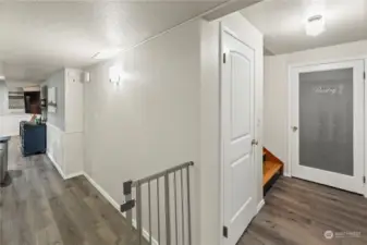 Heading down to the daylight basement, you'll find several storage closets, The large laundry, 2 more bedrooms and the large entertainment room.