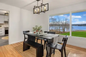 Dining room located between the kitchen and living room.