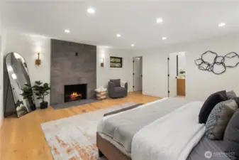 Spacious is the theme in this space, the primary does not disappoint form the wide plank oak floors to that designer tiled fireplace, you will not want to leave your room!