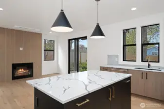 Love how the black windows and beautiful wood floors look together!
