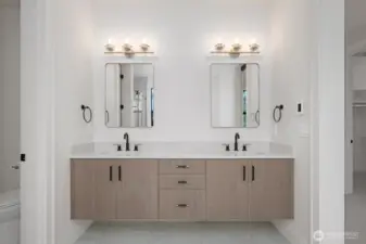 I love the way these cabinets float. Designer hardware, fixtures and quartz countertops!