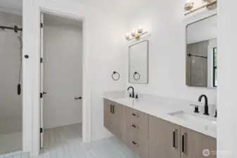 Double vanities and floating Belmont cabinets in Primary