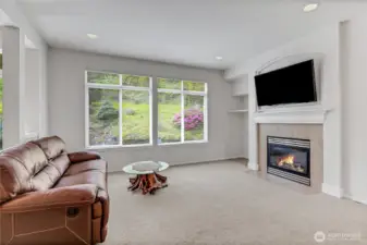 Family Room has gas fireplace w/fan