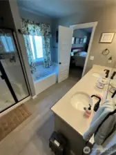 Master bath with jacuzzi and large shower
