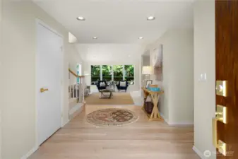Enter to a bright foyer that brings you to the living room or the hall to the kitchen/ family room.