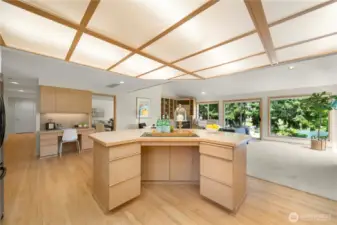 Single level living with primary off the main level hall prior to kitchen.
