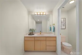 Upper level main bath with tub and shower combo.