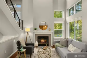 Family room has cathedral ceilings and a gas fireplace