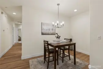 Dedicated dining space with new lighting.