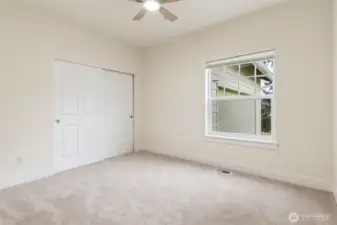 Bedroom 1 with new ceiling fan.